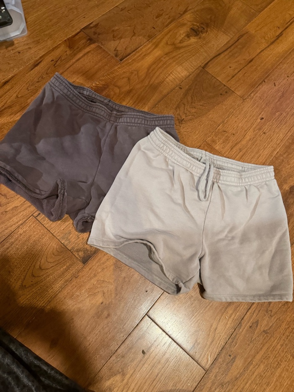 SKIMS Fleece Lounge Shorts in Light Gray and Charcoal